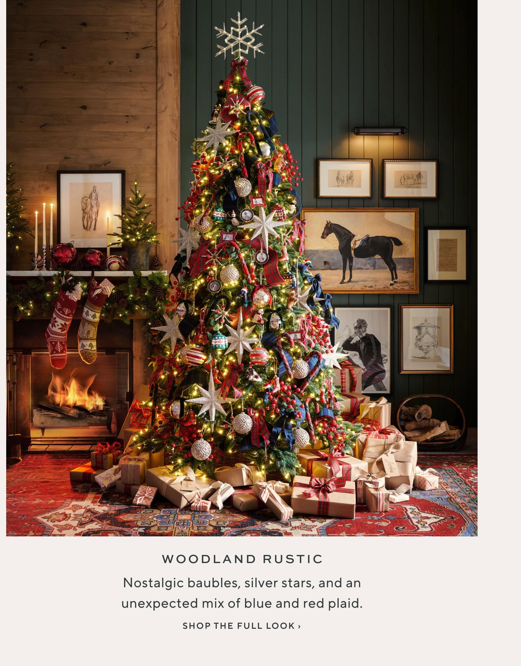 Woodland Rustic: nostalgic baubles, silver stars, and an unexpected mix of blue and red plaid. Shop the full look.
